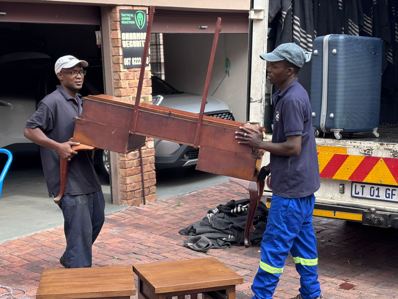 Home furniture loading onto moving truck in Cape Town suburbs
